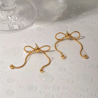 Bead Adorned Bow Earrings