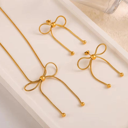Bead Adorned Bow Earrings