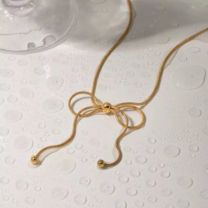Bead Adorned Bow Necklace