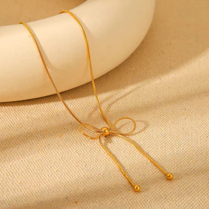 Bead Adorned Bow Necklace