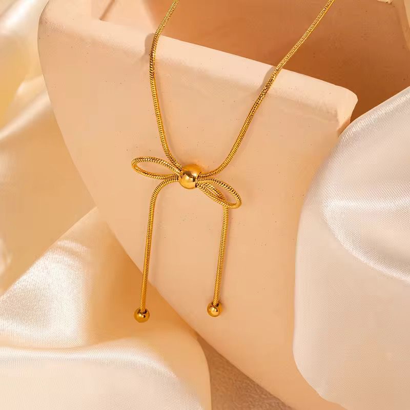 Bead Adorned Bow Necklace